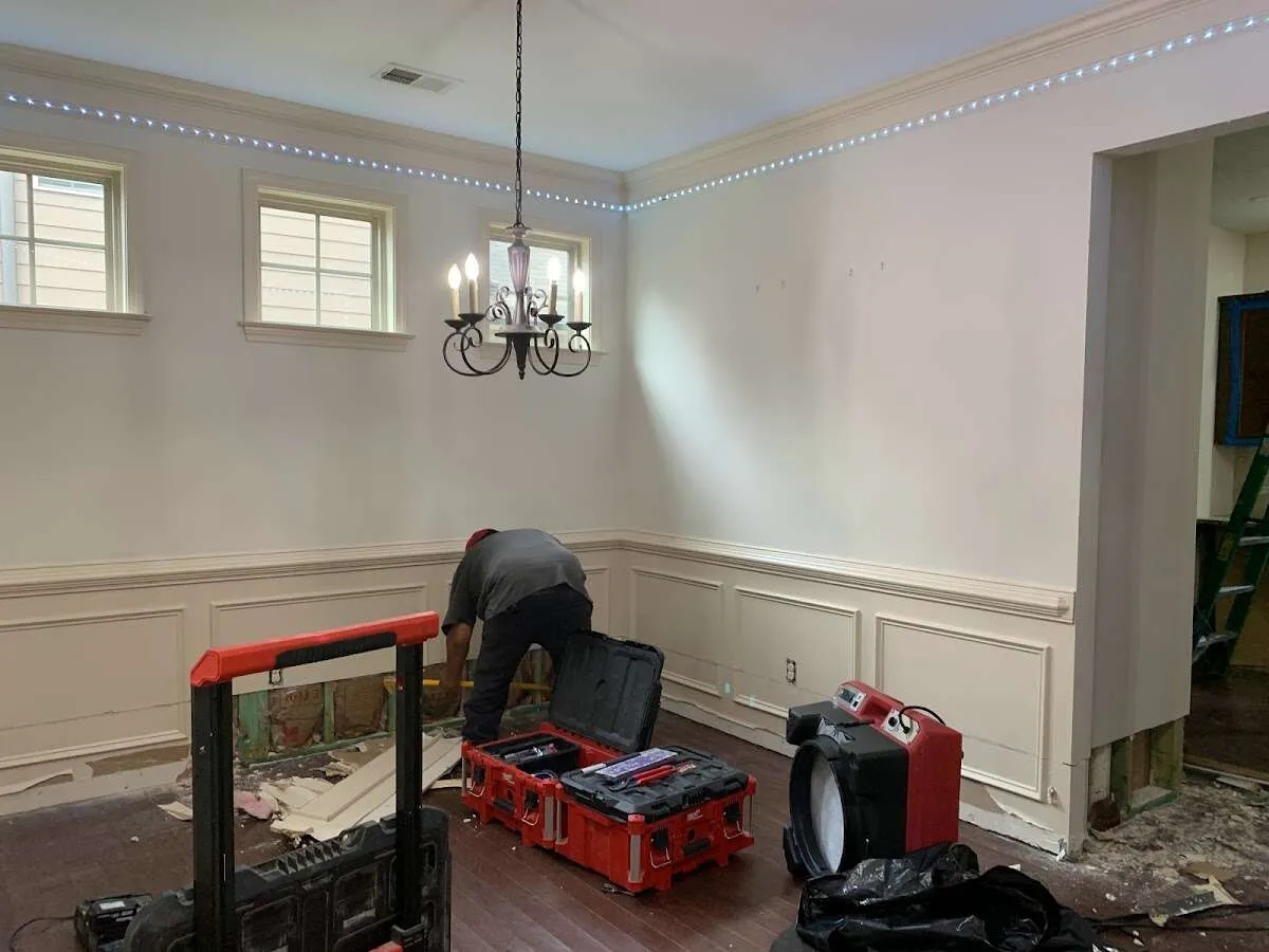 Restoration technician with professional equipment in Boston